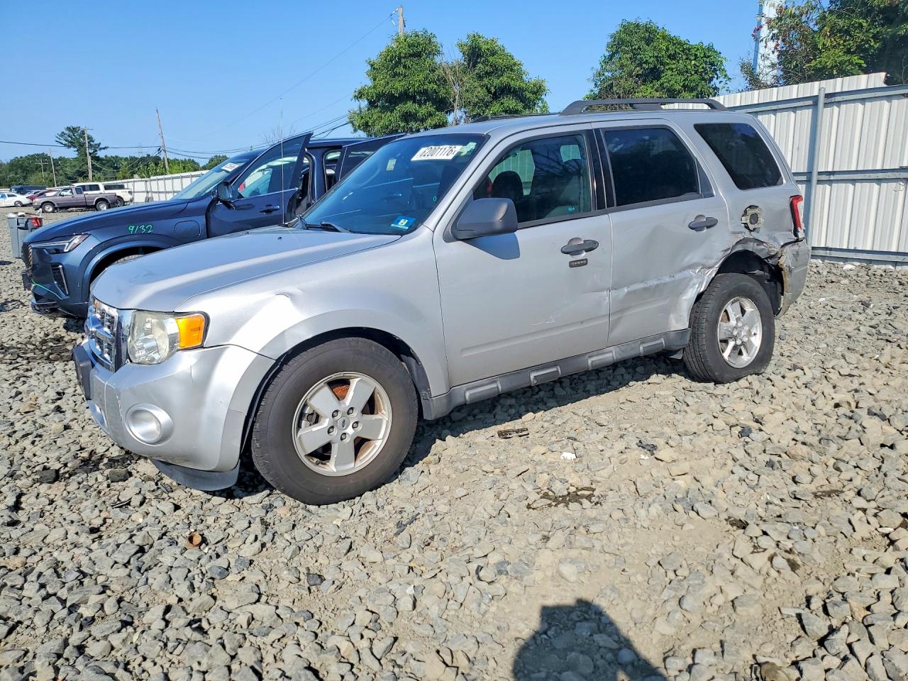1FMCU9D73BKC11581 · 2011 FORD ESCAPE