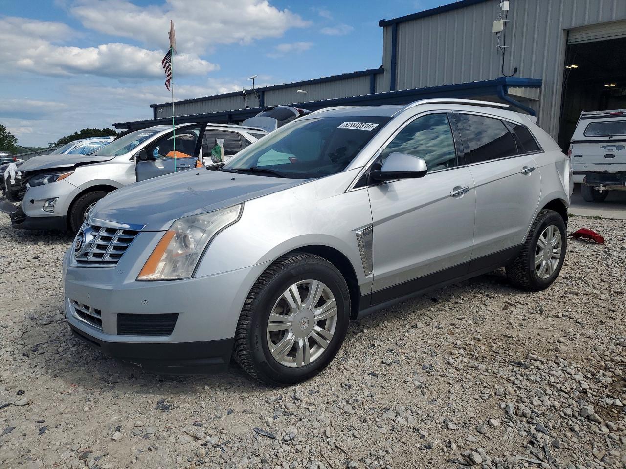 3GYFNEE3XFS594443 · 2015 CADILLAC SRX