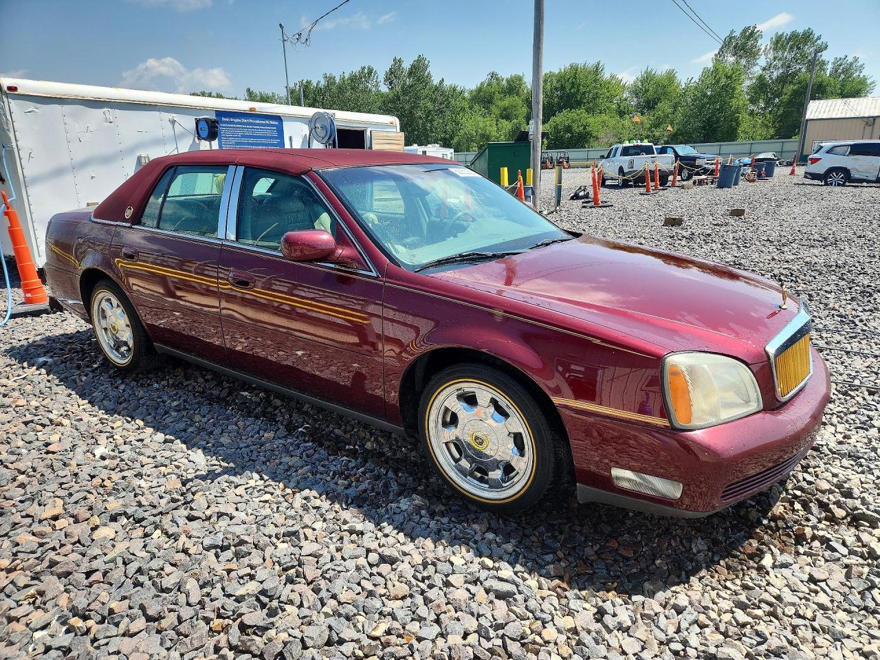 1G6KD57Y32U132268 · 2002 CADILLAC DEVILLE · 4/12