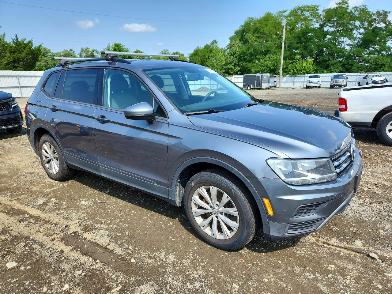 3VV0B7AX3JM119868 · 2018 VOLKSWAGEN TIGUAN · 4/13