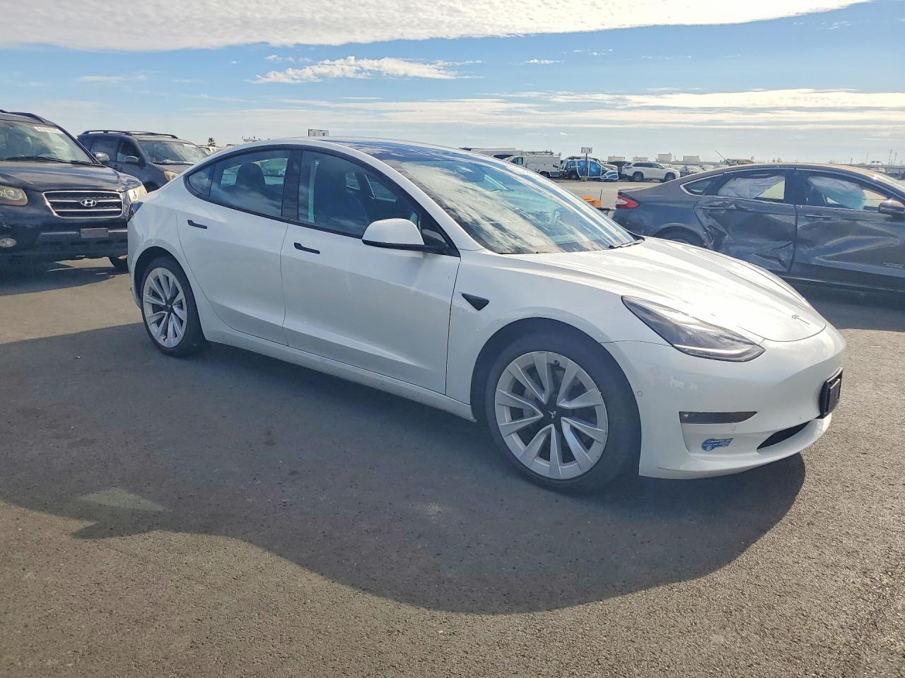 5YJ3E1EB2MF863064 · 2021 TESLA MODEL 3 · 4/12