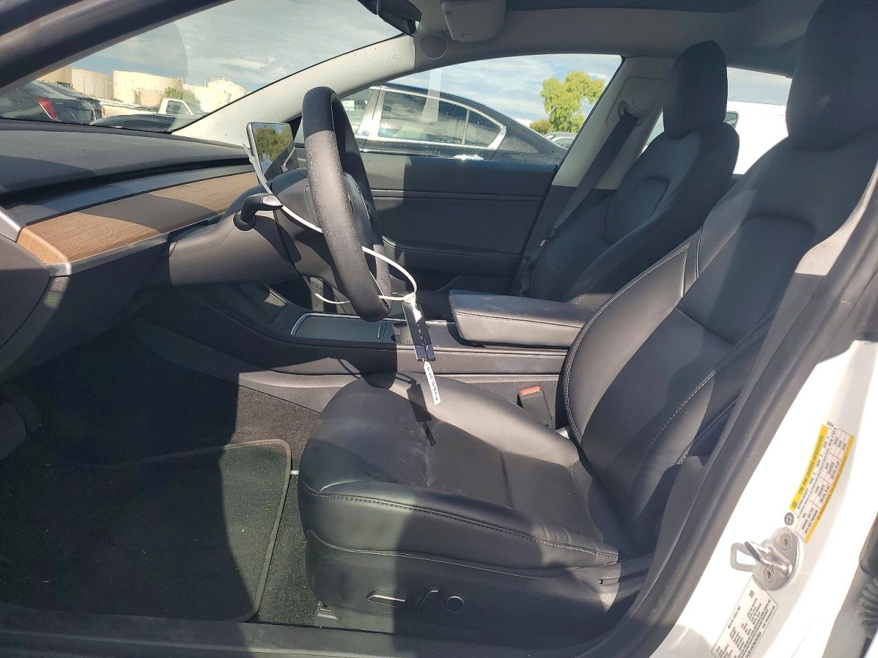 5YJ3E1EB2MF863064 · 2021 TESLA MODEL 3 · 7/12
