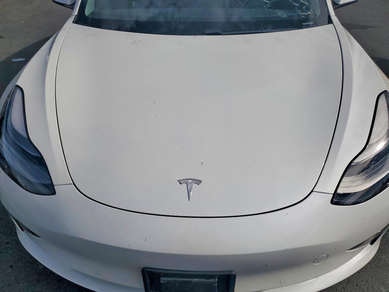 5YJ3E1EB2MF863064 · 2021 TESLA MODEL 3 · 11/12