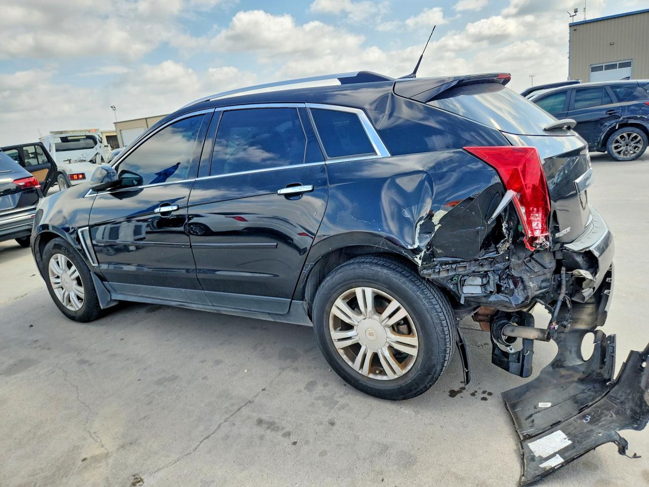 3GYFNBE3XES582094 · 2014 CADILLAC SRX · 2/13