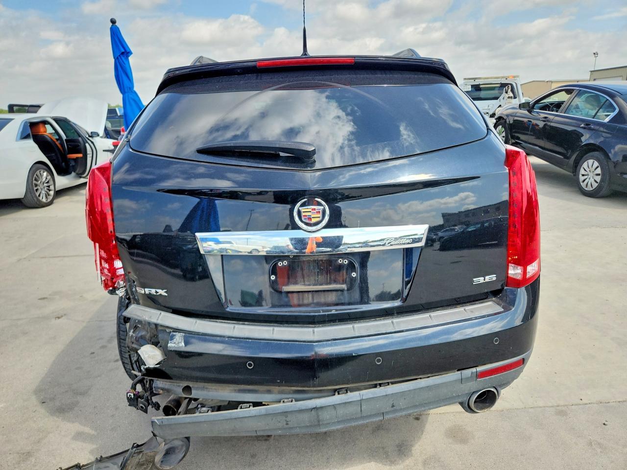 3GYFNBE3XES582094 · 2014 CADILLAC SRX · 6/13