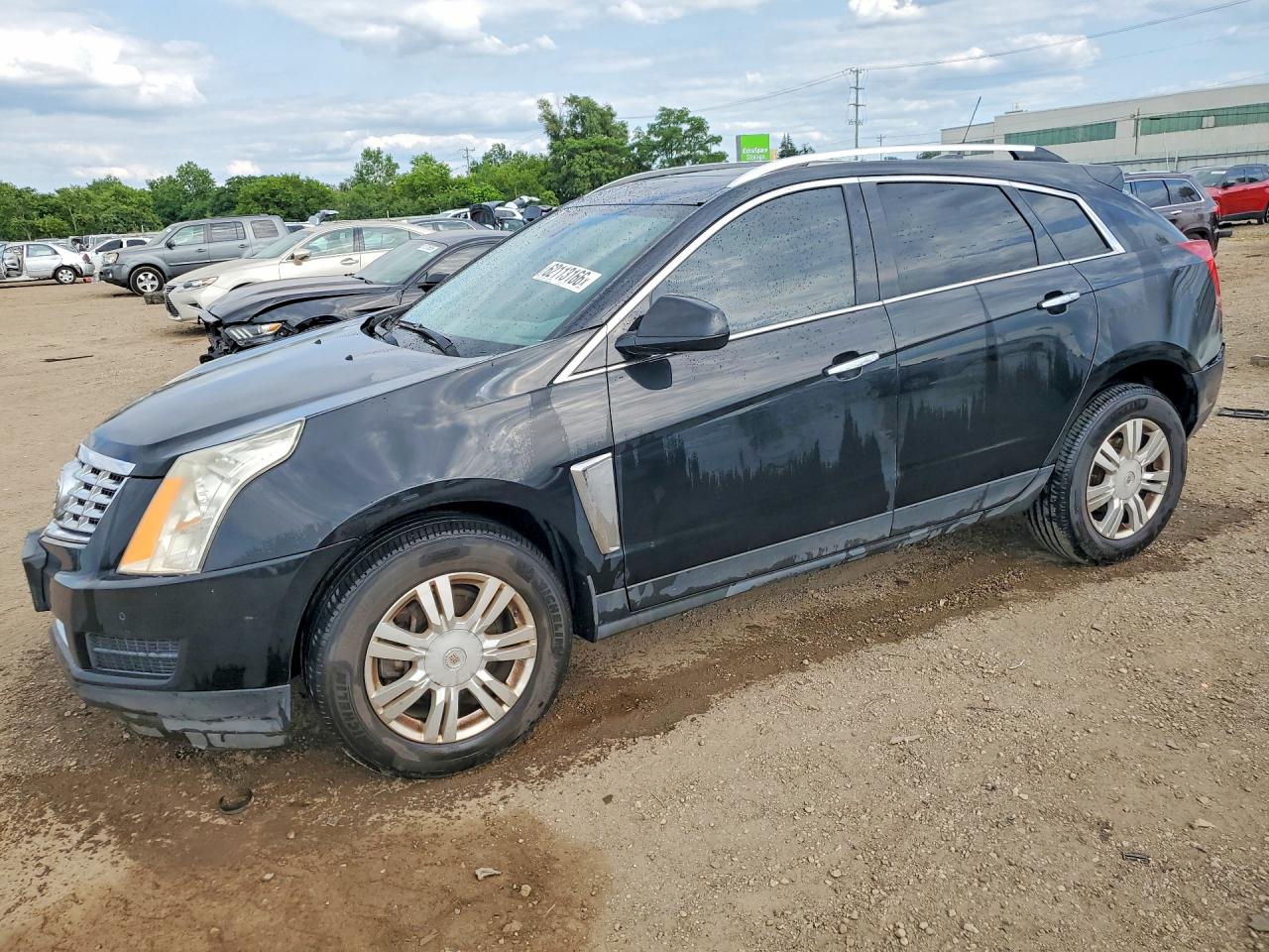 3GYFNEE36FS597095 · 2015 CADILLAC SRX