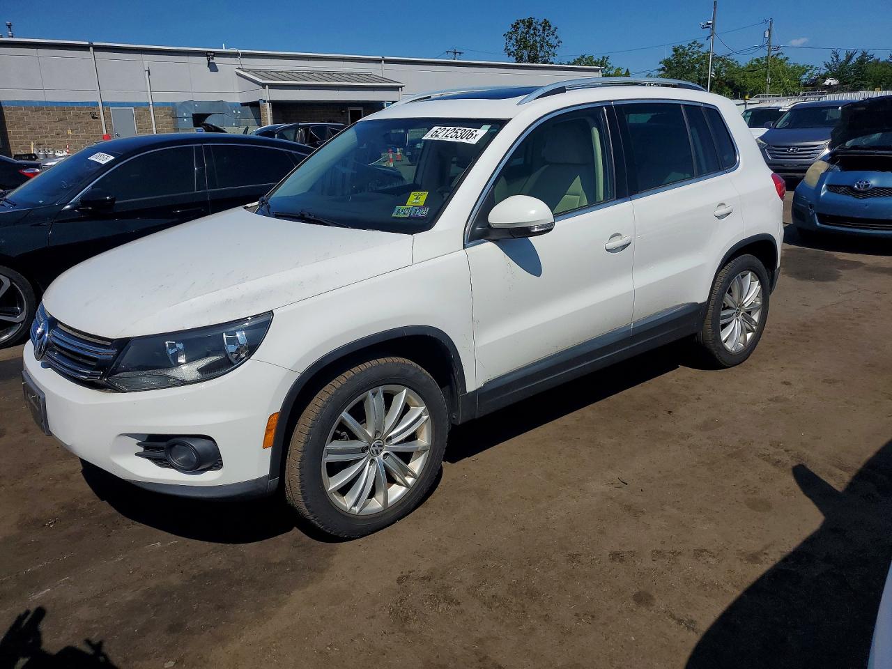 WVGBV3AX2EW523382 · 2014 VOLKSWAGEN TIGUAN