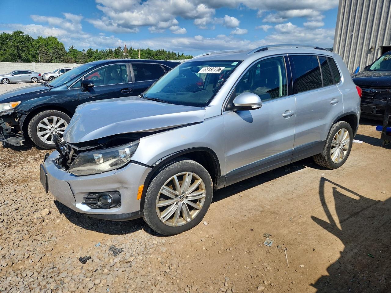 WVGBV7AX6FW106100 · 2015 VOLKSWAGEN TIGUAN