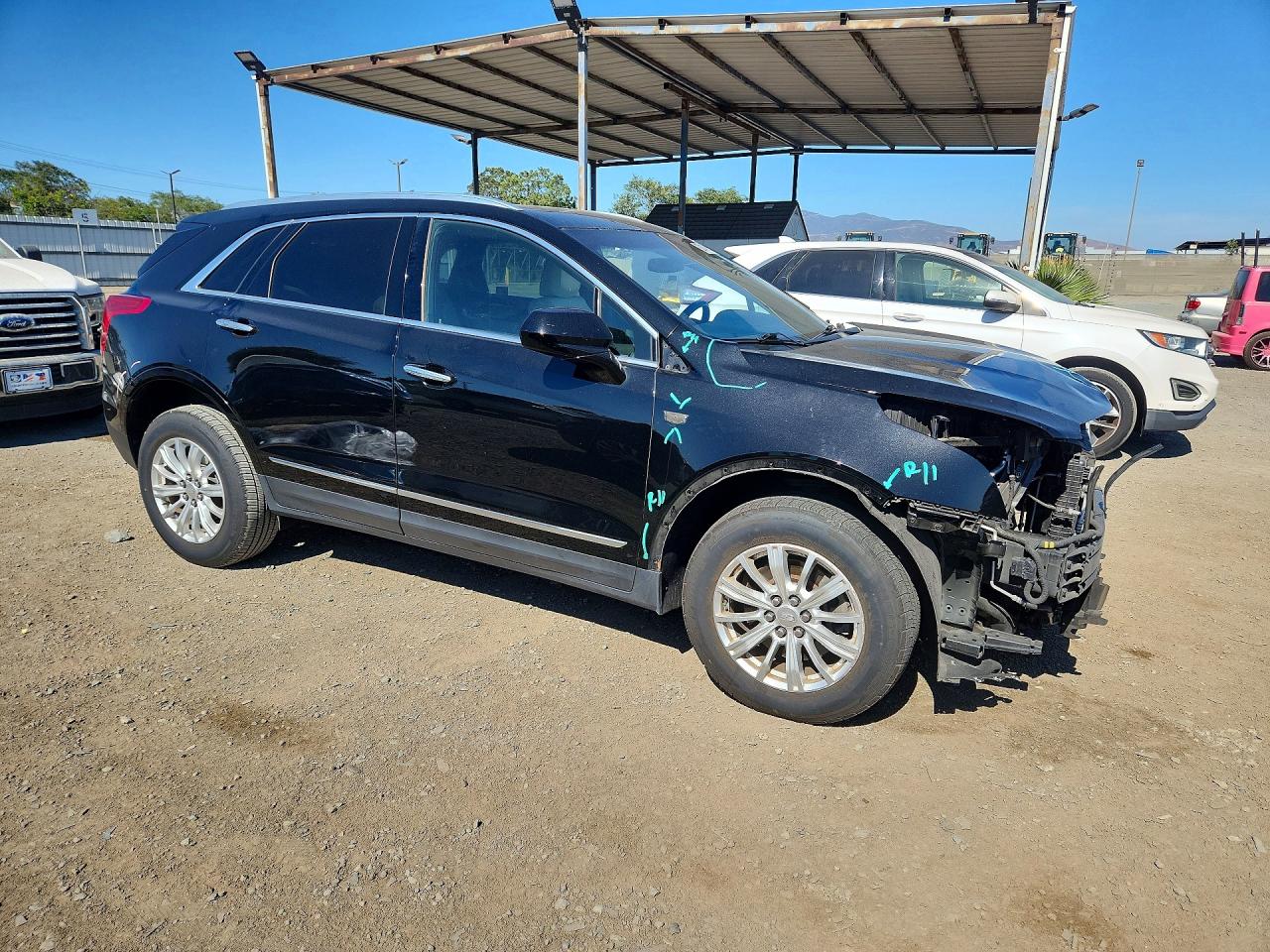 1GYKNARS9KZ261690 · 2019 CADILLAC XT5 · 4/14