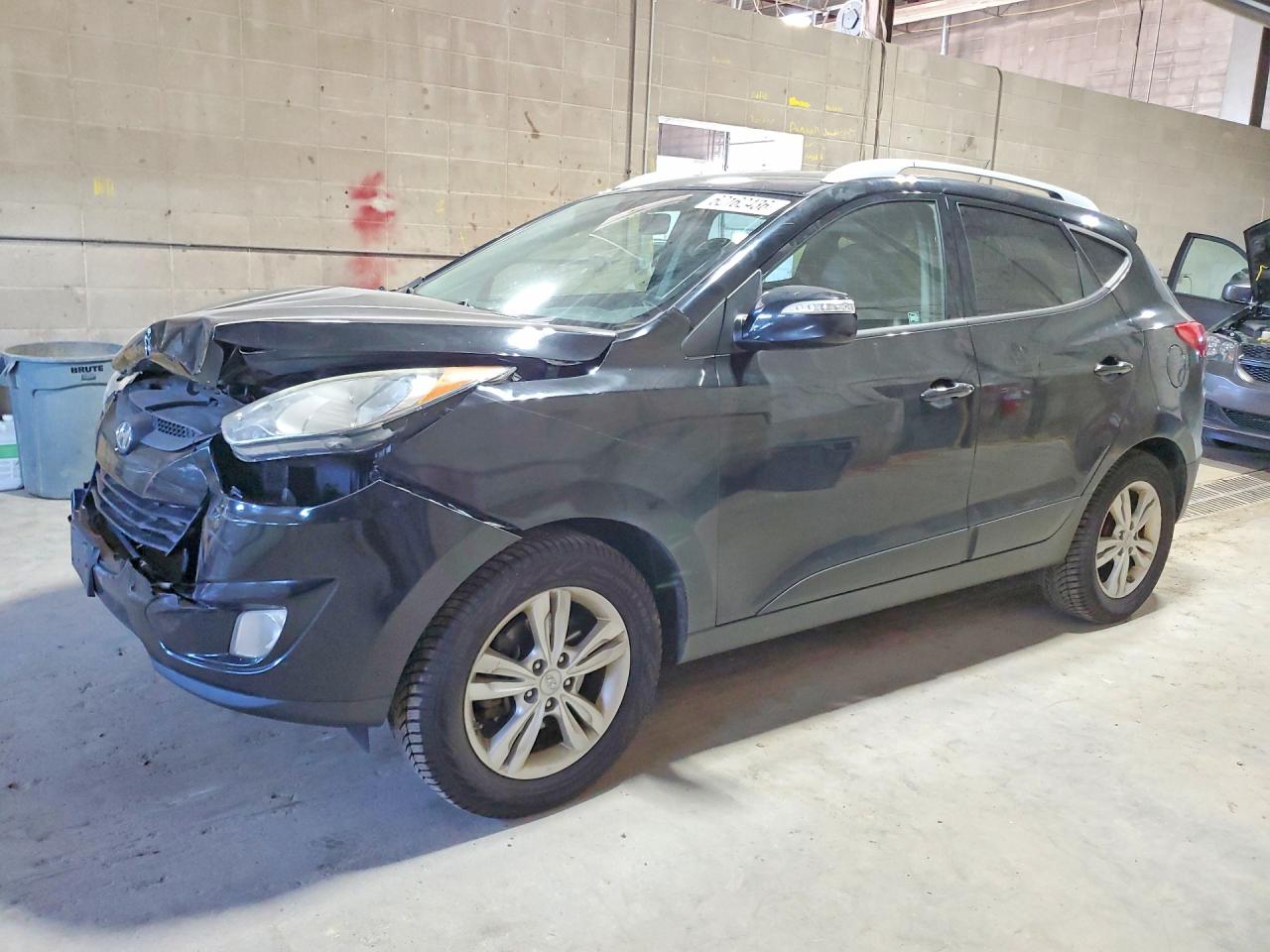 KM8JUCAC5DU608190 · 2013 HYUNDAI TUCSON