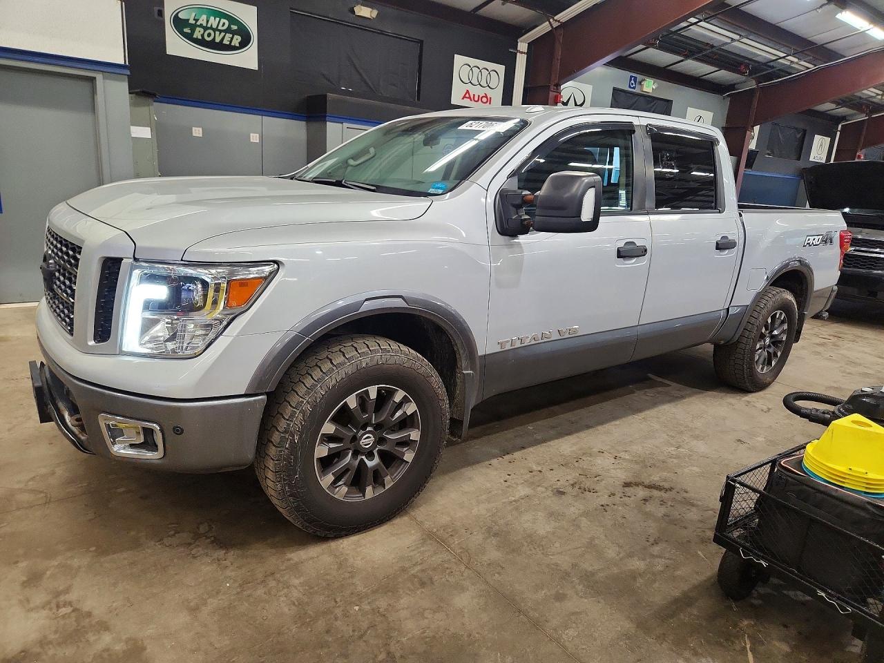 1N6AA1E55JN527271 · 2018 NISSAN TITAN