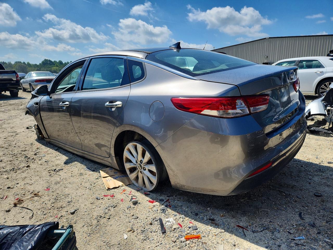 5XXGU4L35JG205068 · 2018 KIA OPTIMA · 2/12