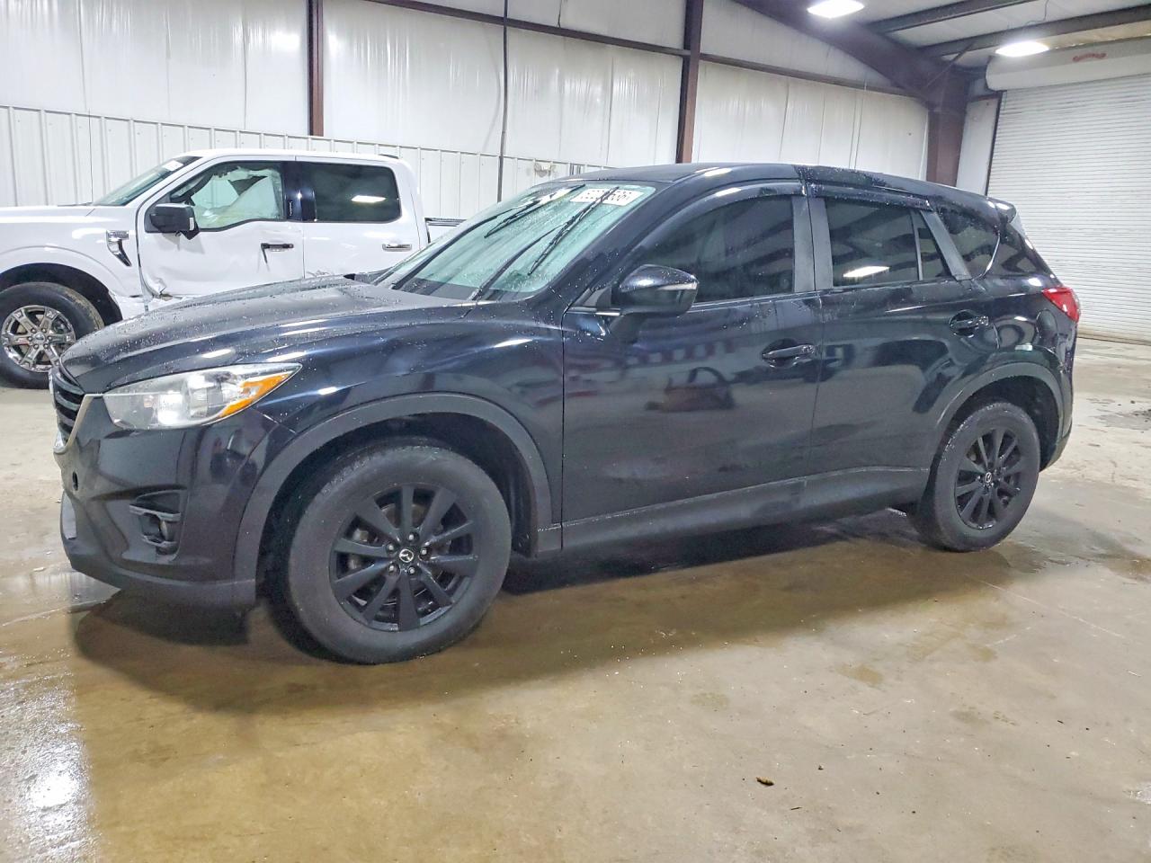 JM3KE4CY3G0865646 · 2016 MAZDA CX-5
