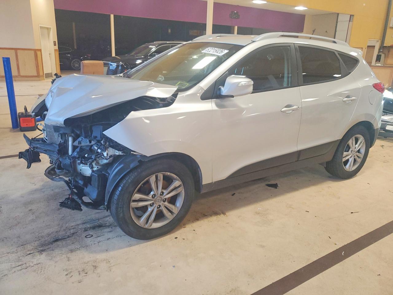 KM8JUCAC1DU740928 · 2013 HYUNDAI TUCSON