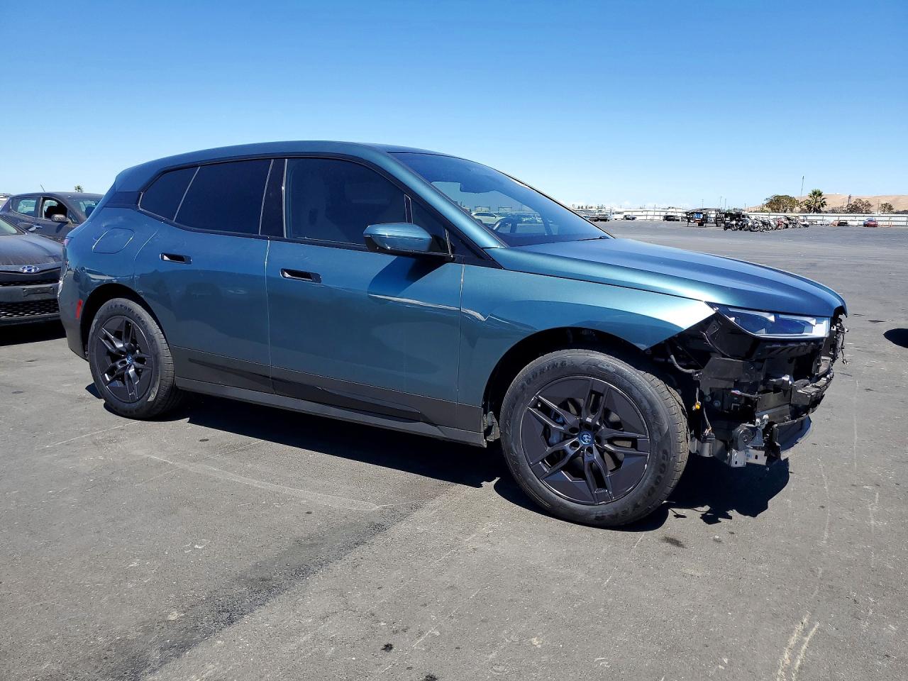 WB523CF07RCR74252 · 2024 BMW IX · 4/13