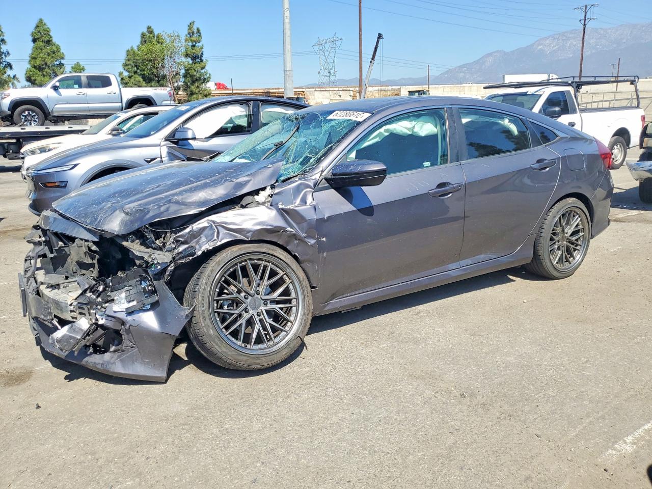2HGFC2F76HH521332 · 2017 HONDA CIVIC