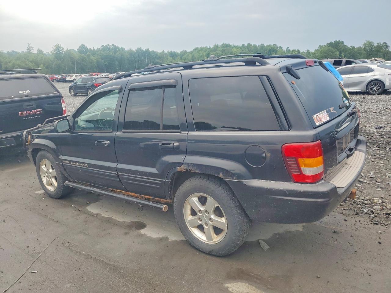 1J8GW68J53C555955 · 2003 JEEP GRAND CHEROKEE · 2/13