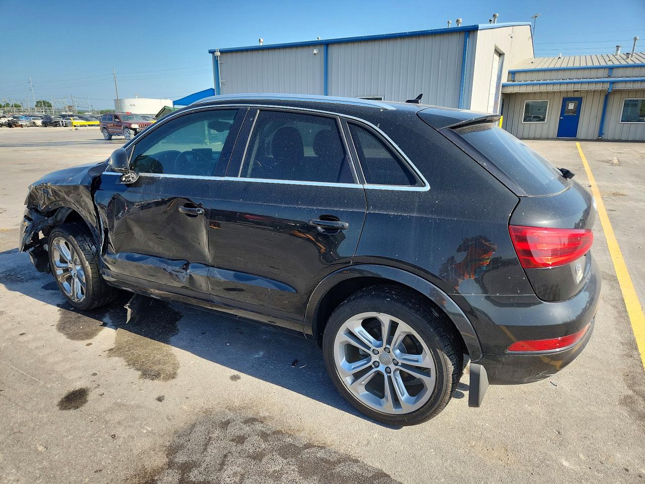 WA1EFCFS9FR000947 · 2015 AUDI Q3 · 2/13