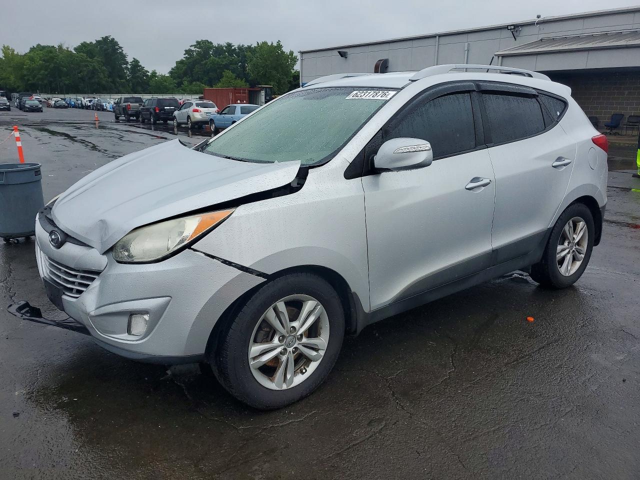 KM8JUCAC5DU593285 · 2013 HYUNDAI TUCSON