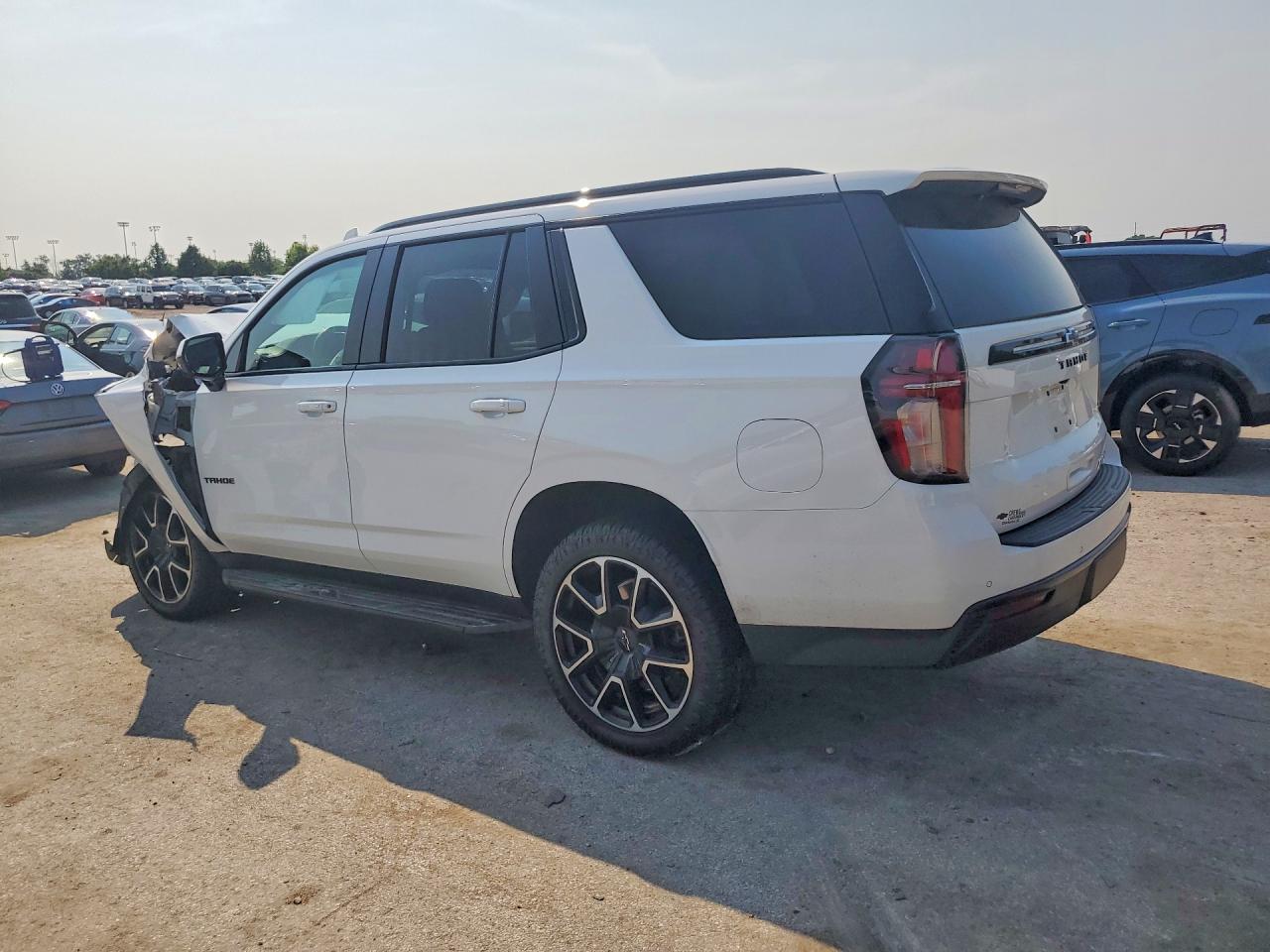 1GNSCRKD9PR133602 · 2023 CHEVROLET TAHOE · 2/12