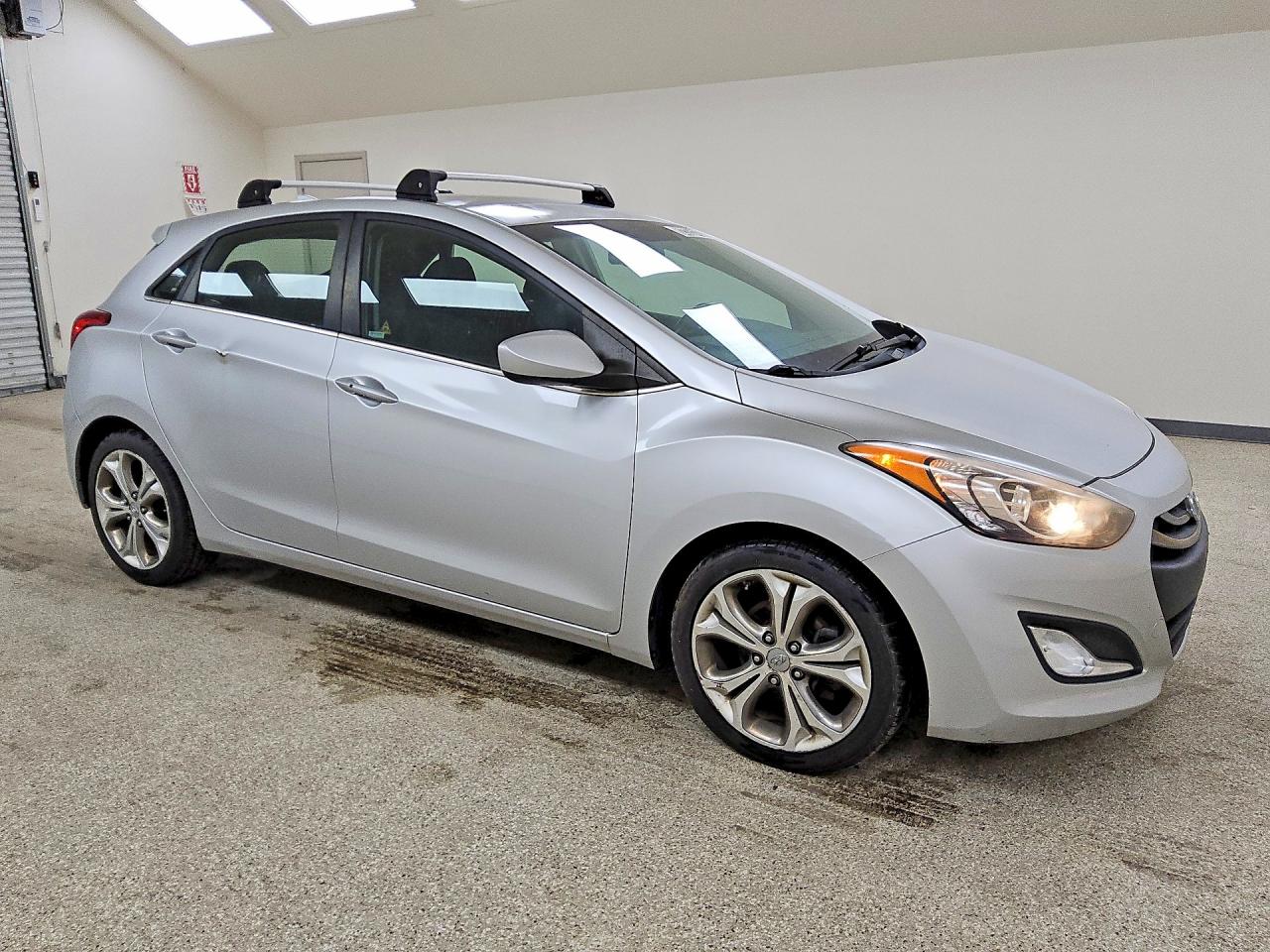 KMHD35LE6DU124491 · 2013 HYUNDAI ELANTRA GT · 4/13