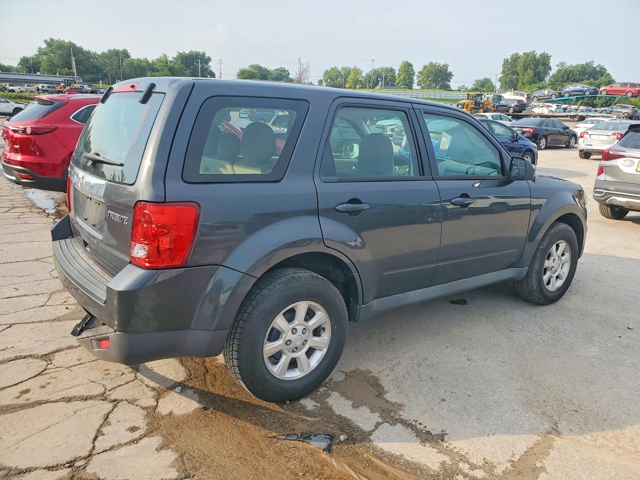 4F2CY0C76AKM02111 · 2010 MAZDA TRIBUTE · 3/13