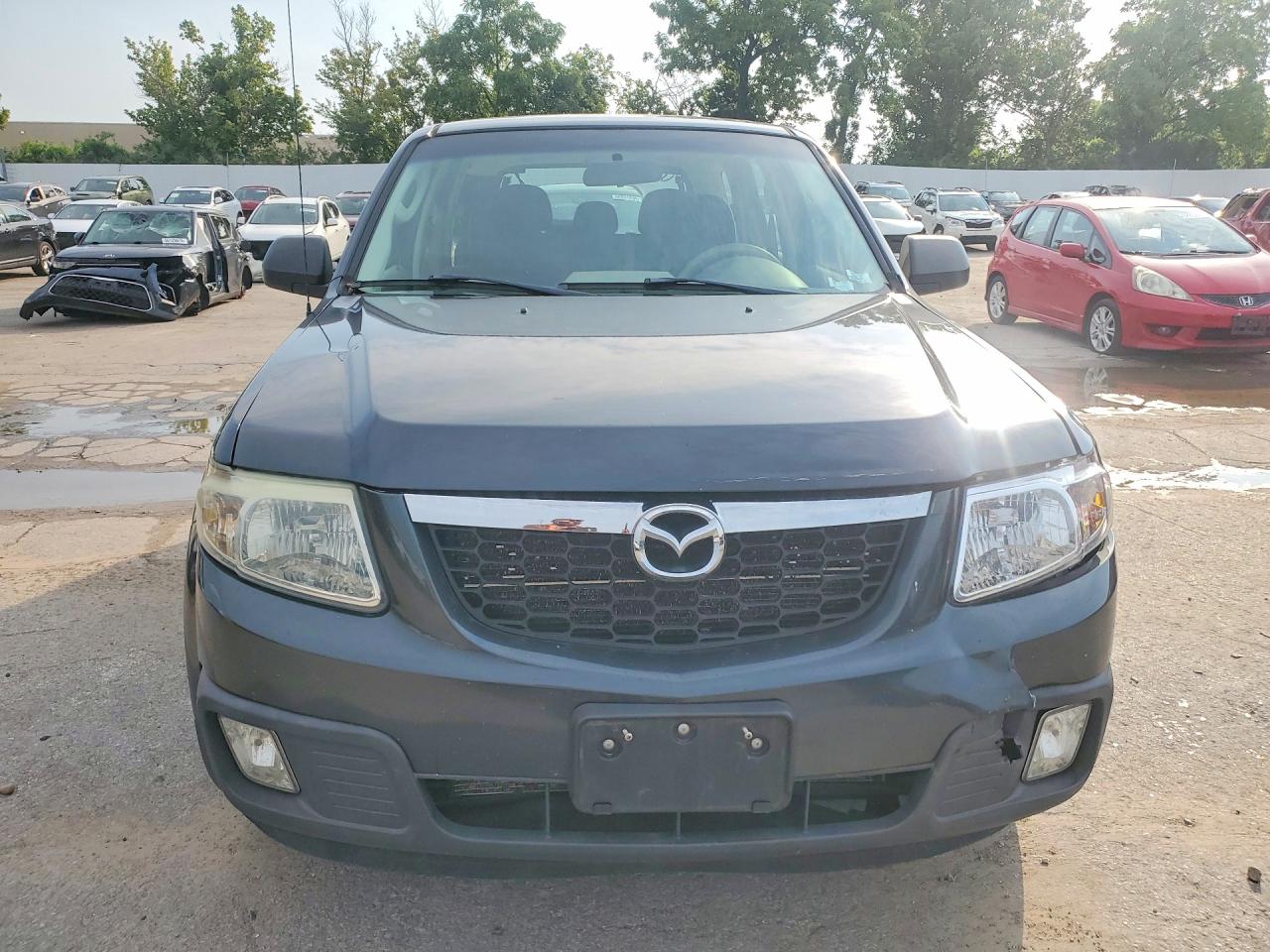 4F2CY0C76AKM02111 · 2010 MAZDA TRIBUTE · 5/13