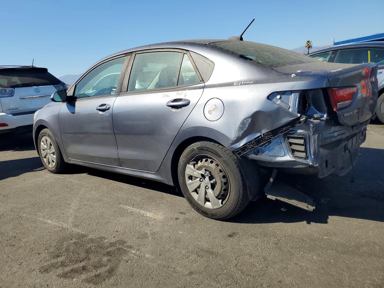 3KPA24AD4LE256094 · 2020 KIA RIO · 2/13