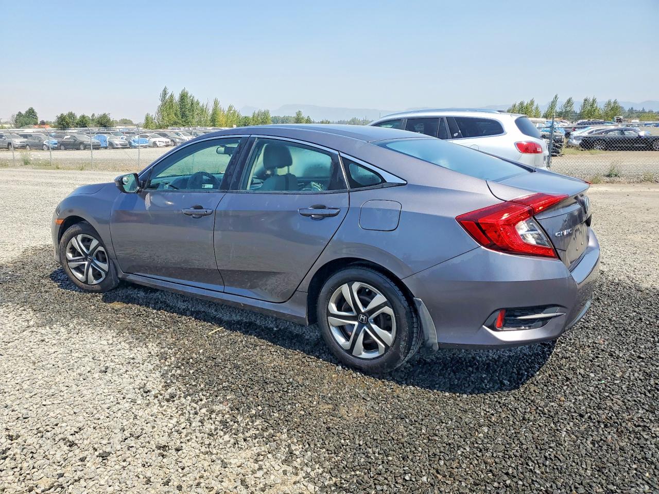 2HGFC2F59JH608727 · 2018 HONDA CIVIC · 2/12
