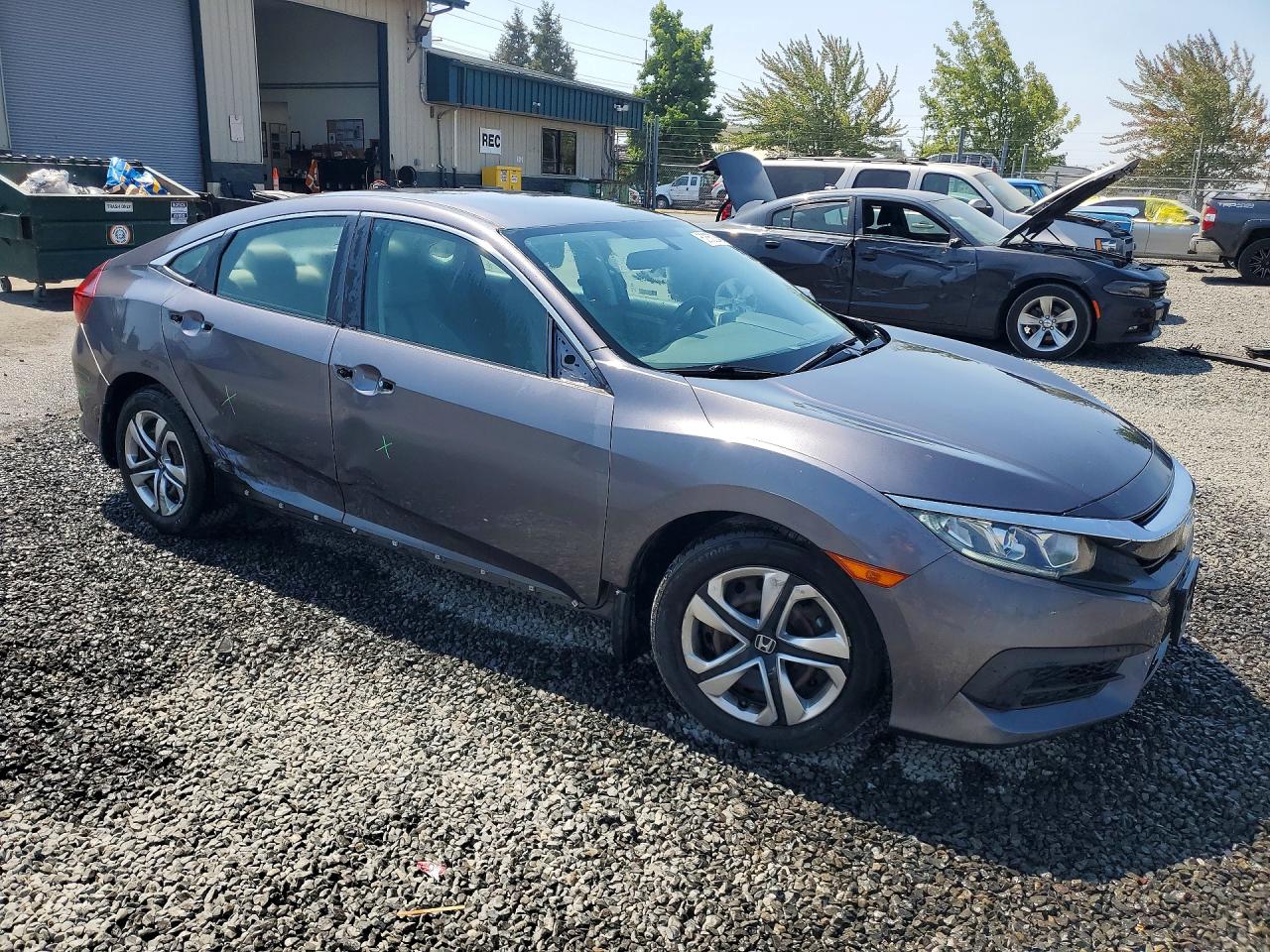 2HGFC2F59JH608727 · 2018 HONDA CIVIC · 4/12