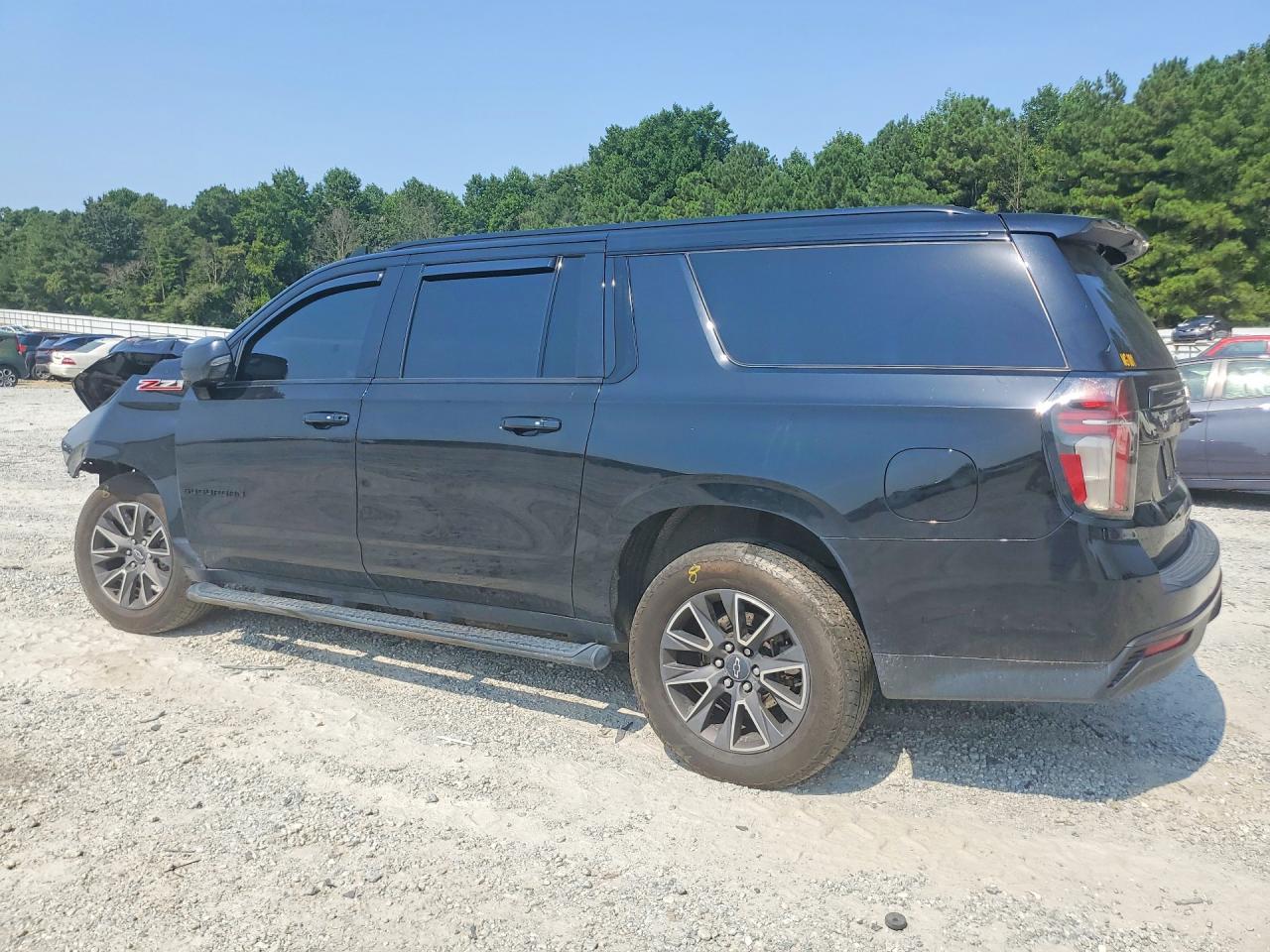 1GNSKDKD8MR143863 · 2021 CHEVROLET SUBURBAN · 2/12