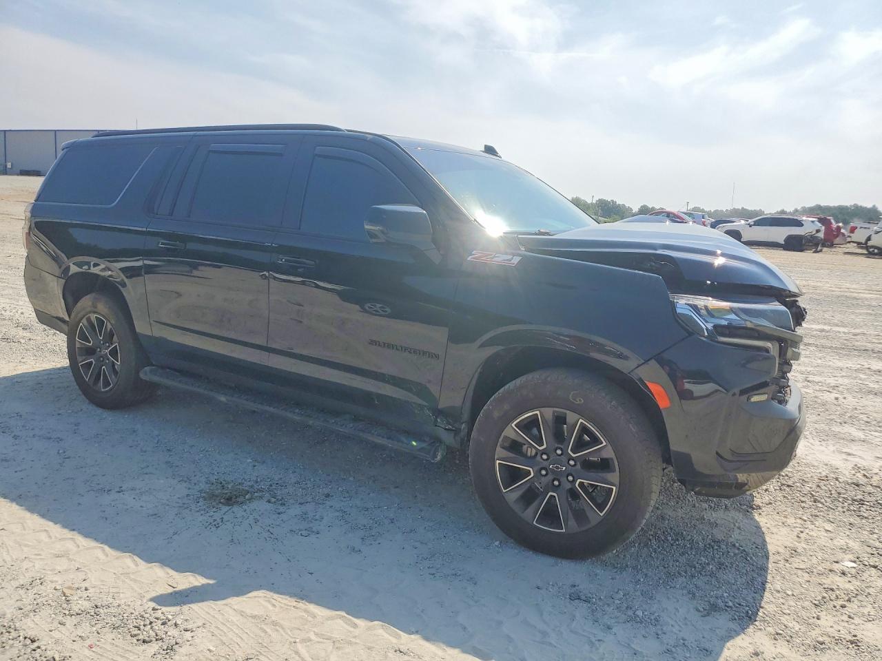 1GNSKDKD8MR143863 · 2021 CHEVROLET SUBURBAN · 4/12