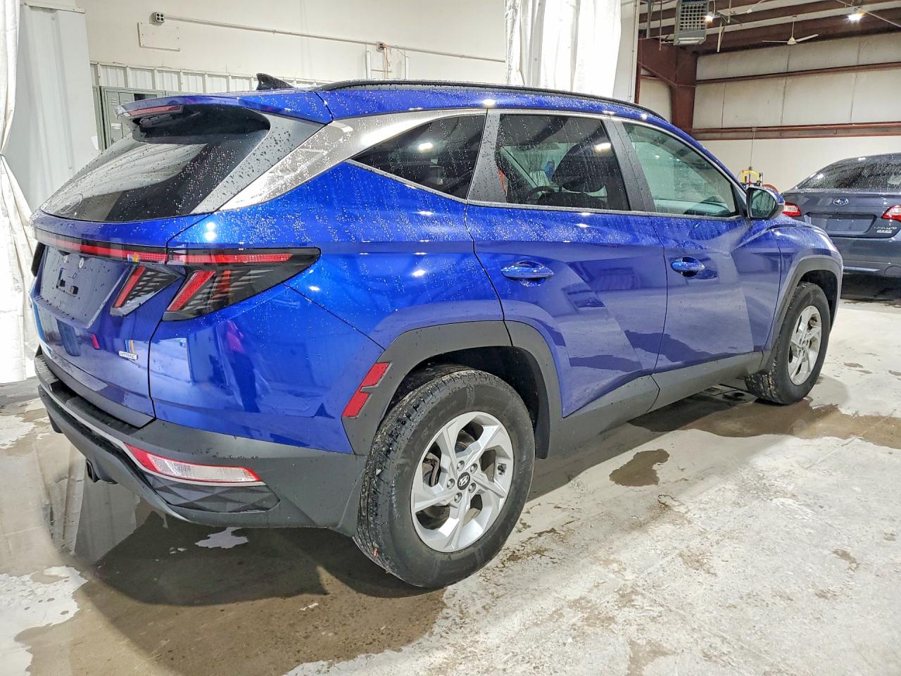 5NMJBCAE4NH142417 · 2022 HYUNDAI TUCSON · 3/14