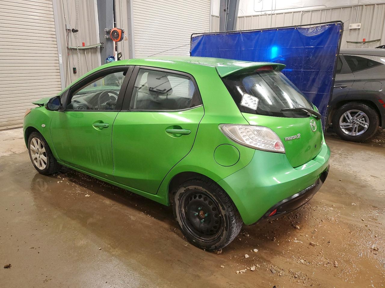 JM1DE1HY9B0125732 · 2011 MAZDA MAZDA2 · 2/12