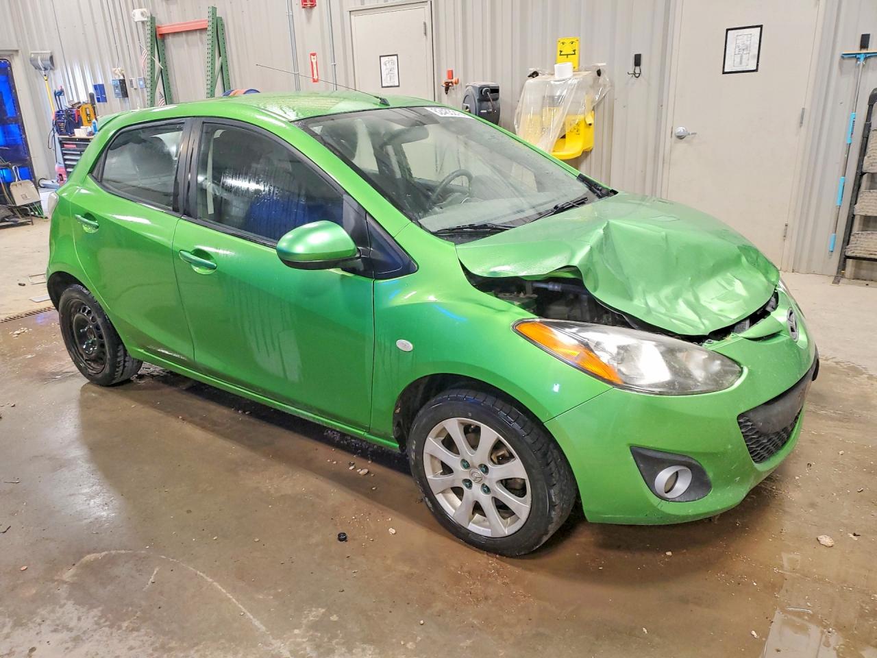 JM1DE1HY9B0125732 · 2011 MAZDA MAZDA2 · 4/12