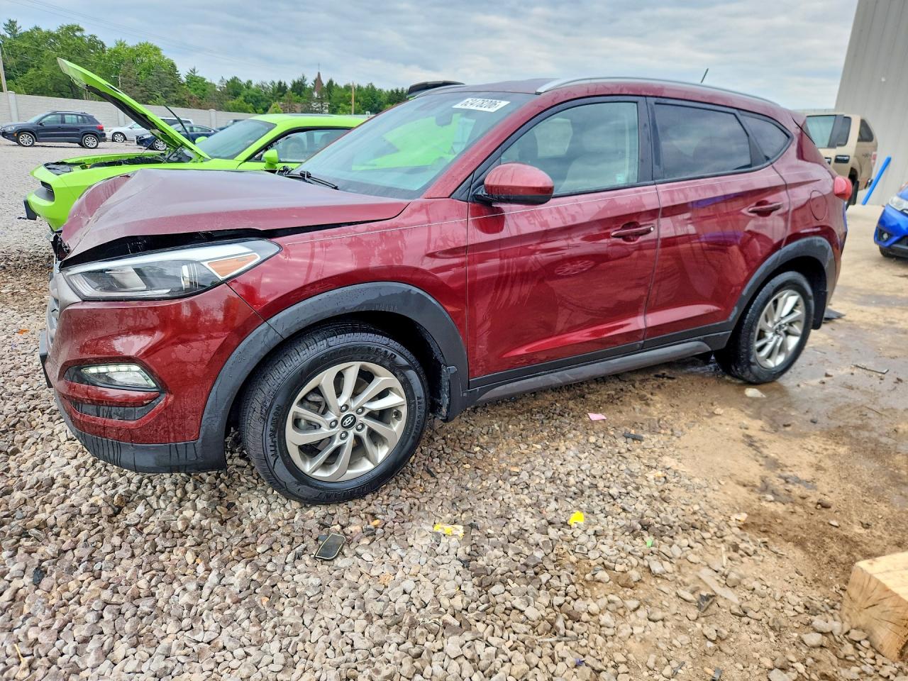 KM8J3CA46GU198581 · 2016 HYUNDAI TUCSON