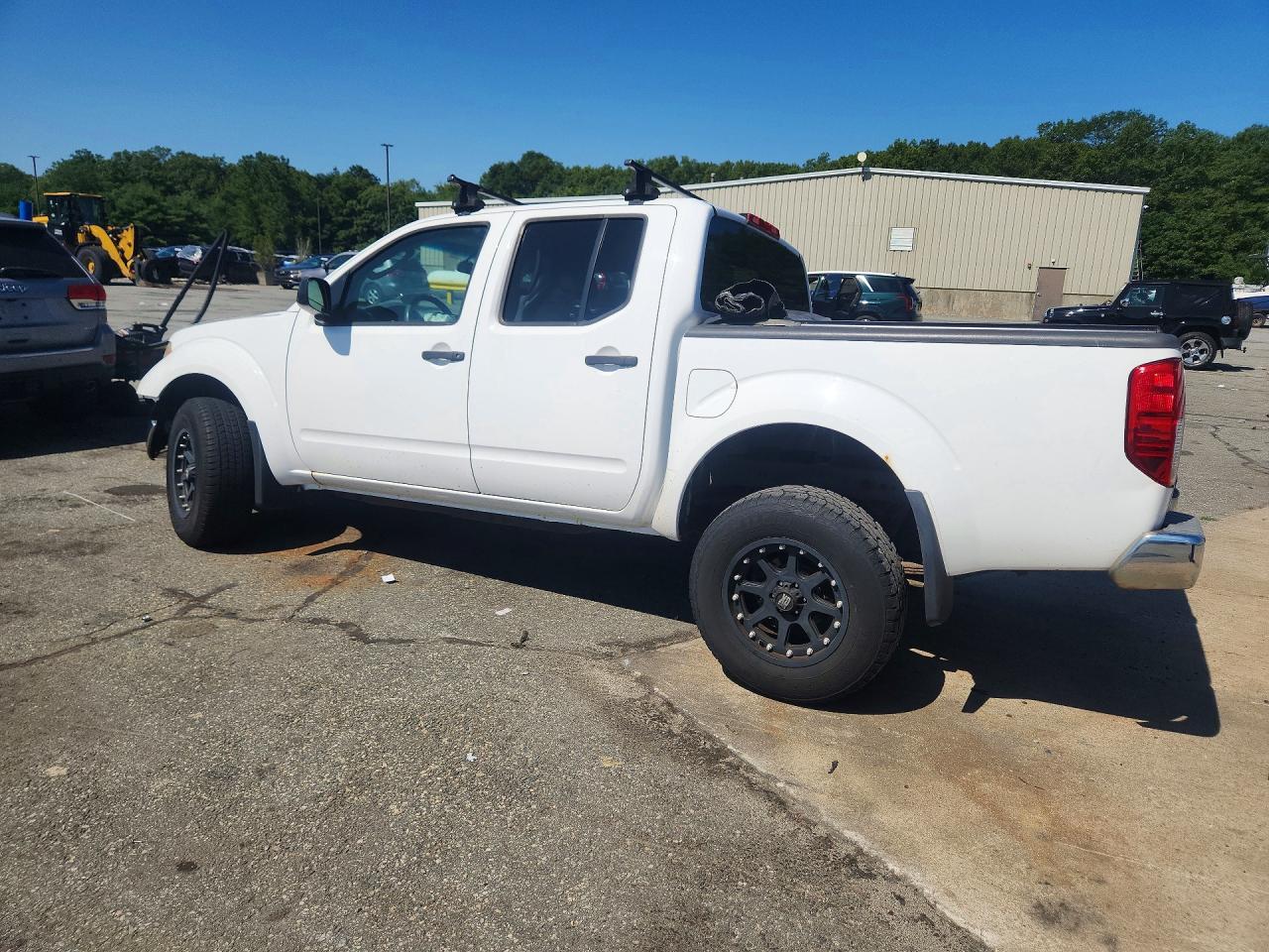 1N6AD0EV6BC430076 · 2011 NISSAN FRONTIER · 2/12