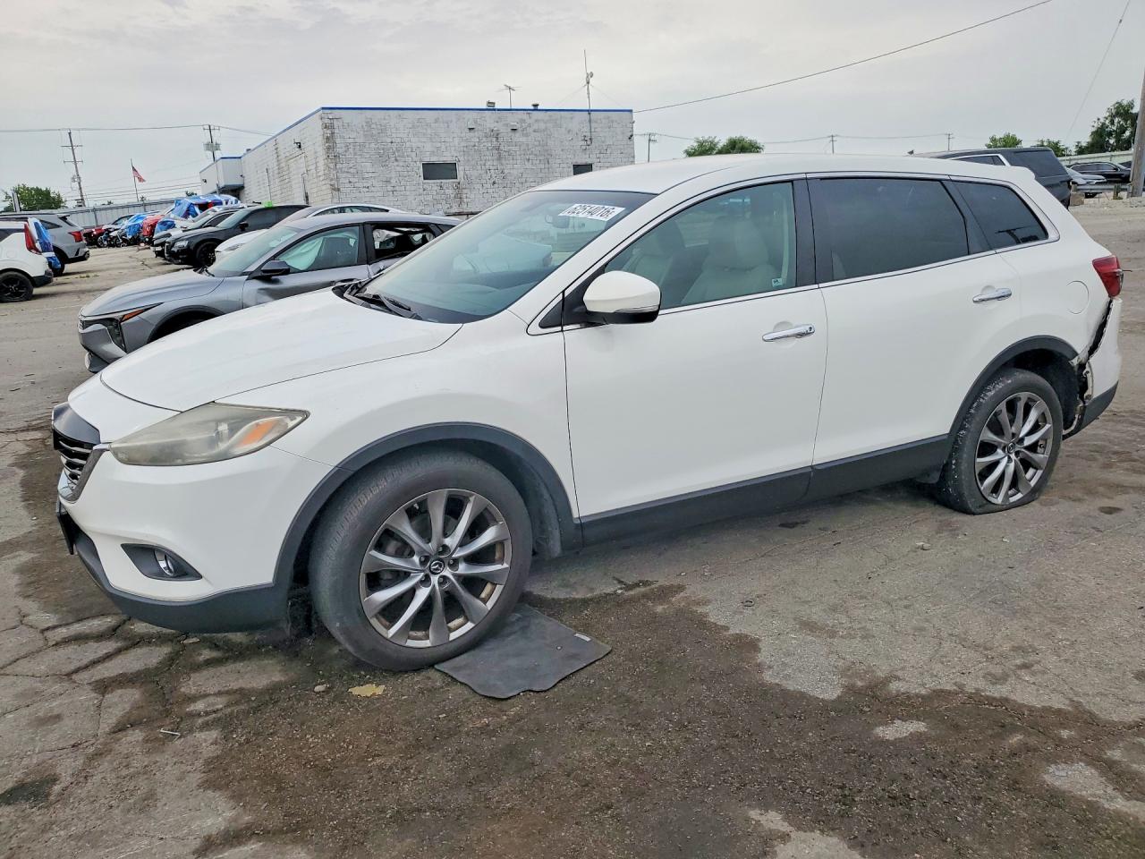 JM3TB3DA6E0437205 · 2014 MAZDA CX-9
