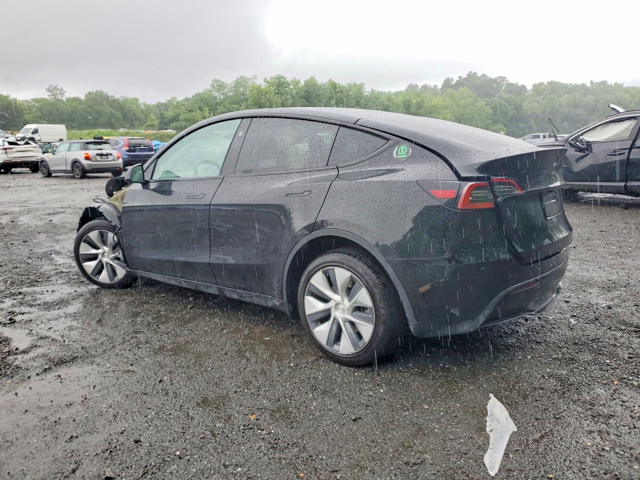 7SAYGDEE3PA184355 · 2023 TESLA MODEL Y · 2/14