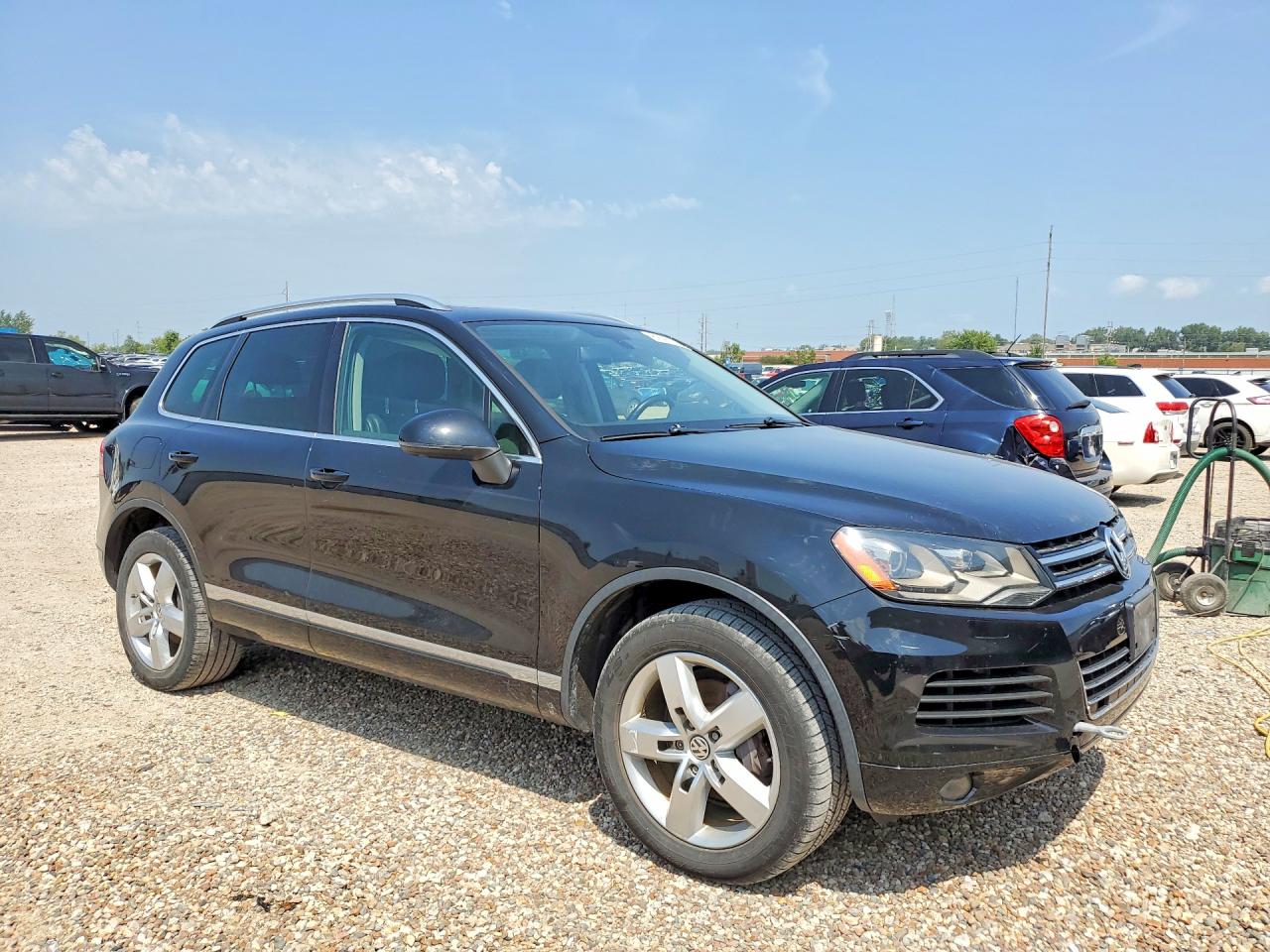 WVGEF9BP1CD011777 · 2012 VOLKSWAGEN TOUAREG · 4/13