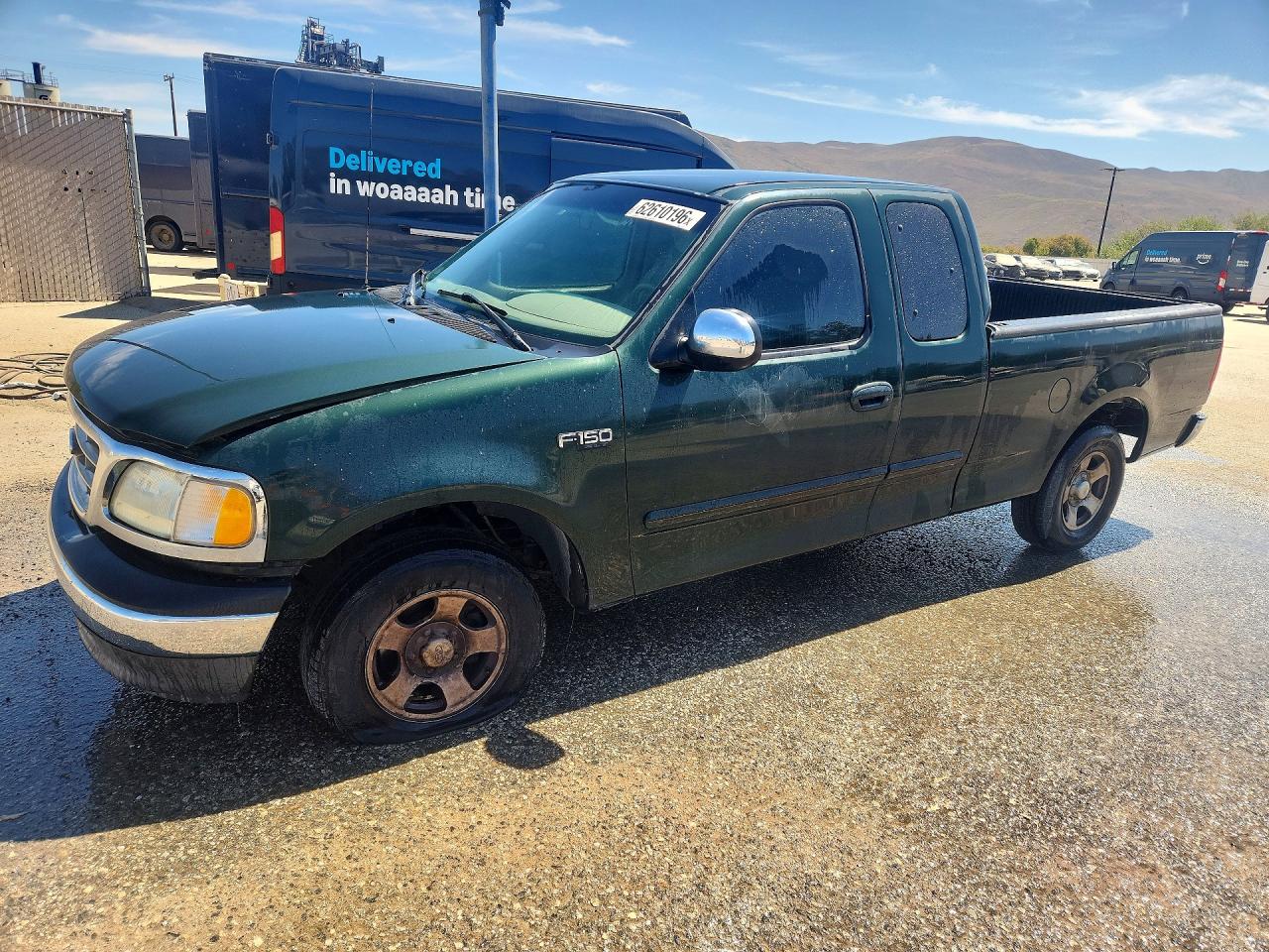 1FTRX172X2NA11528 · 2002 FORD F150