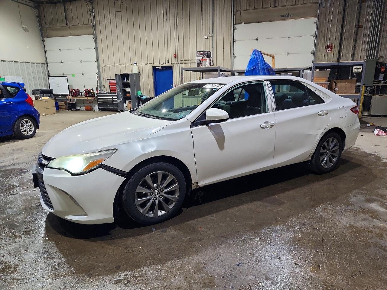 4T1BD1FK1FU159957 · 2015 TOYOTA CAMRY HYBRID