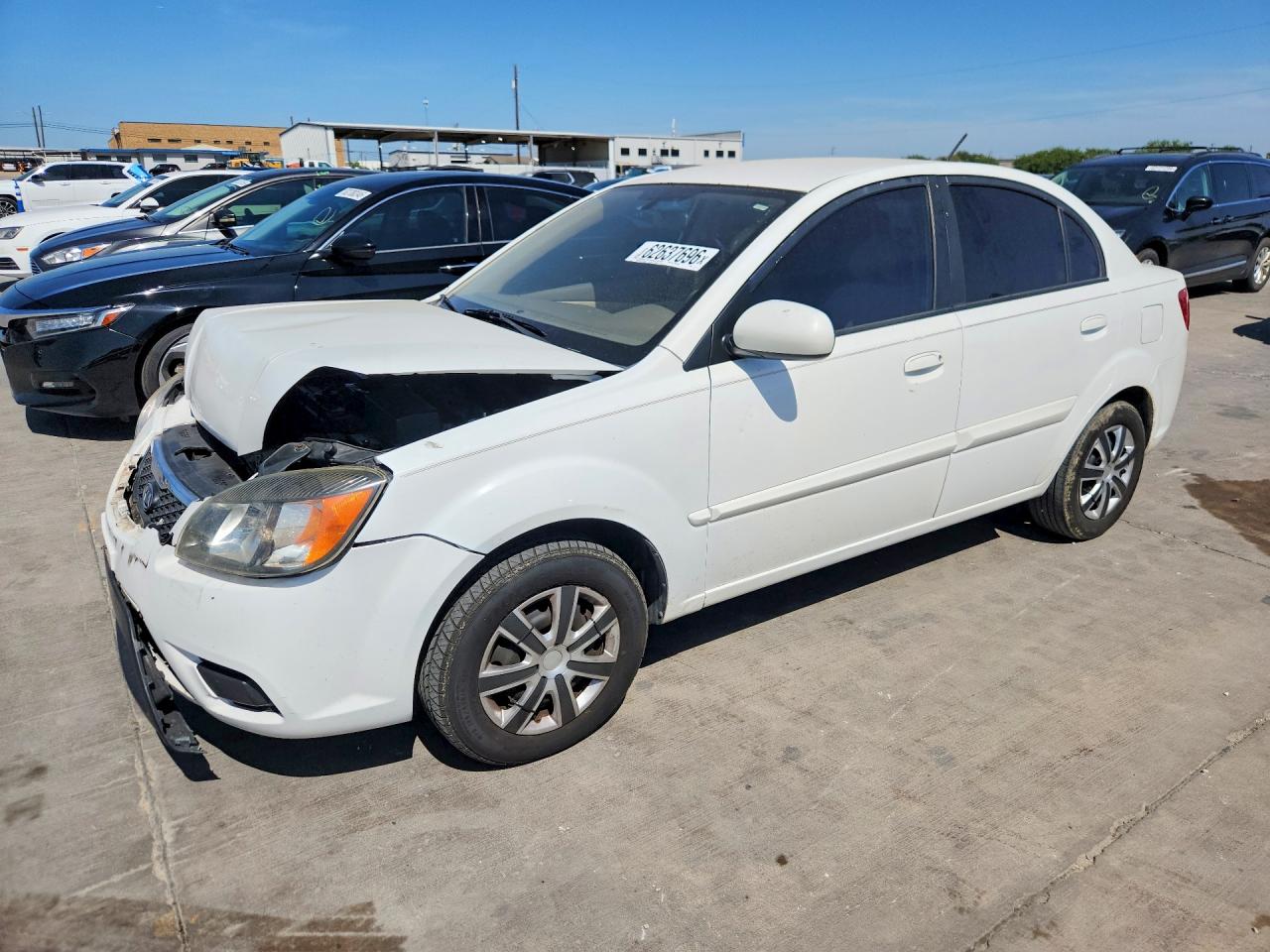 KNADH4A3XB6941561 · 2011 KIA RIO