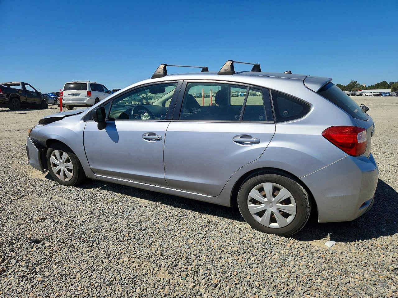 JF1GPAA65E8290995 · 2014 SUBARU IMPREZA · 2/12