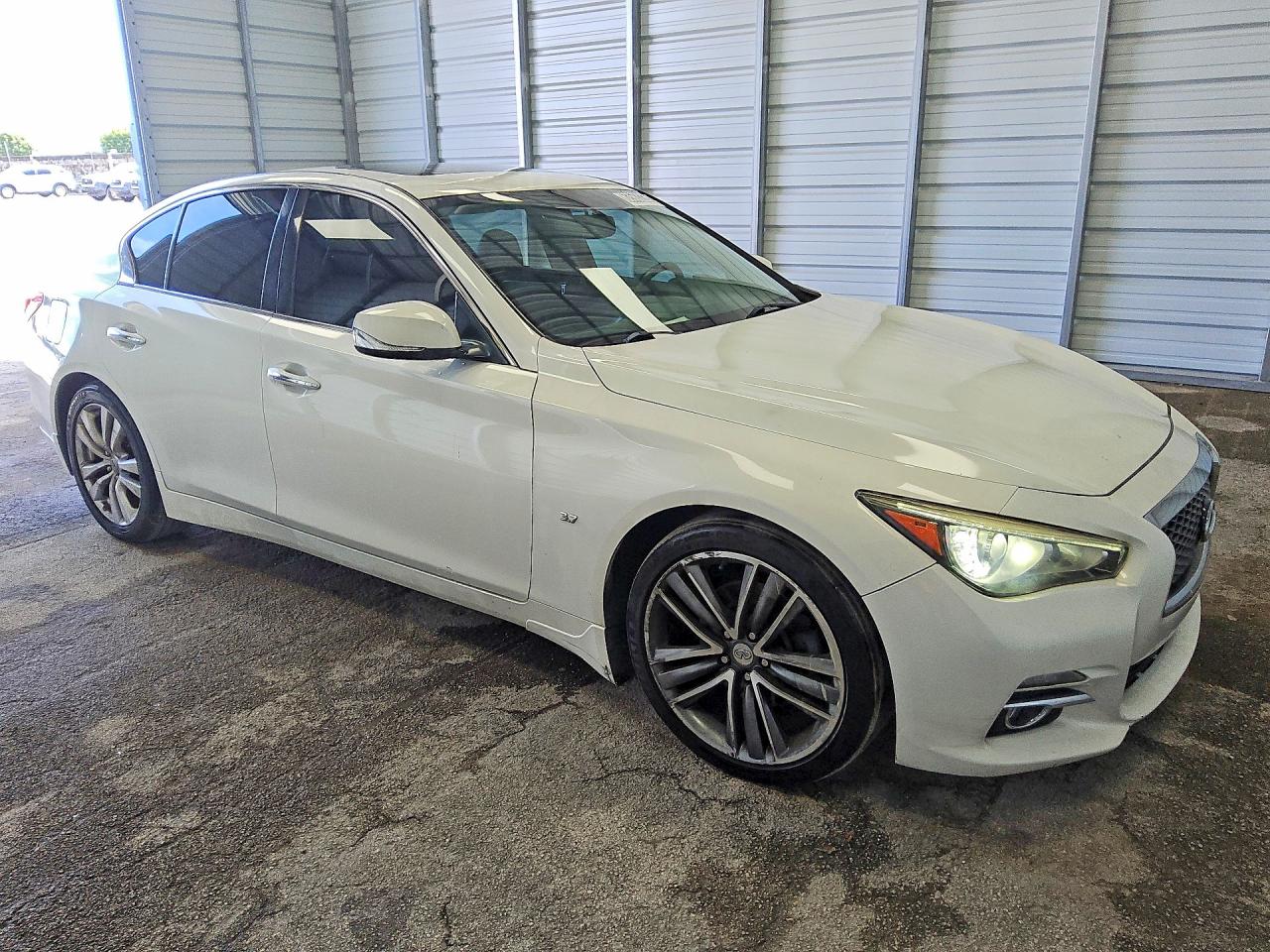 JN1BV7AP9FM338144 · 2015 INFINITI Q50 · 4/12