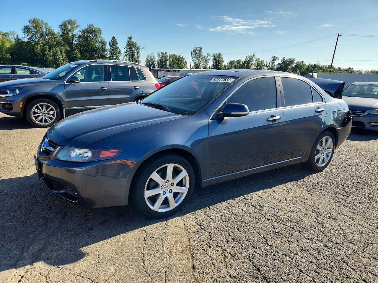 JH4CL96845C005910 · 2005 ACURA TSX