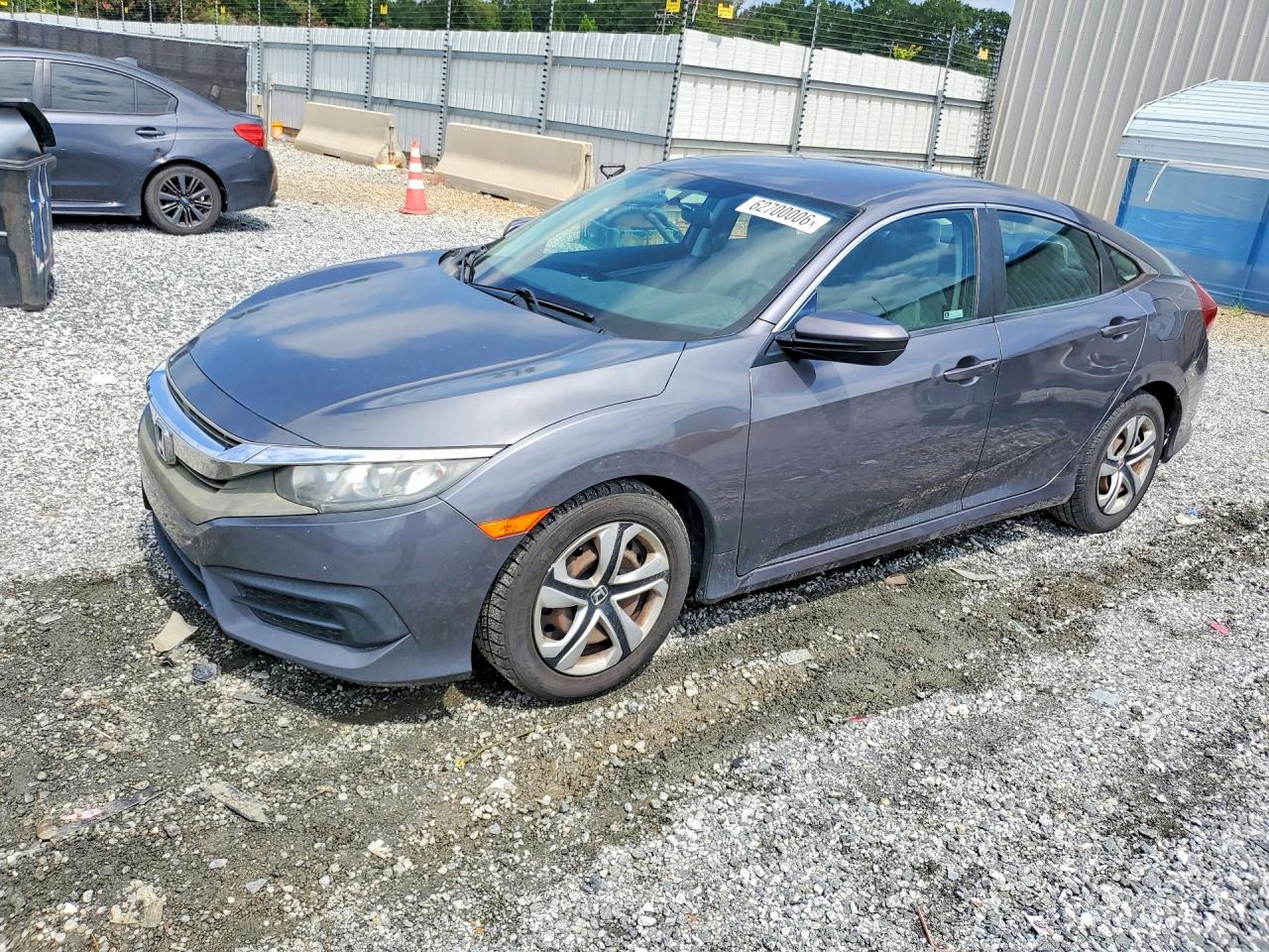 2HGFC2F58JH580693 · 2018 HONDA CIVIC