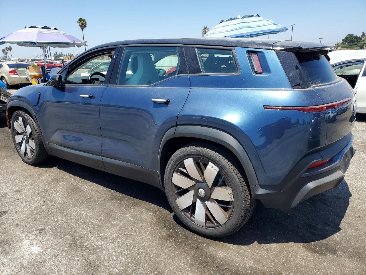 VCF1ZBU2XPG002096 · 2023 FISKER INC. OCEAN · 2/14