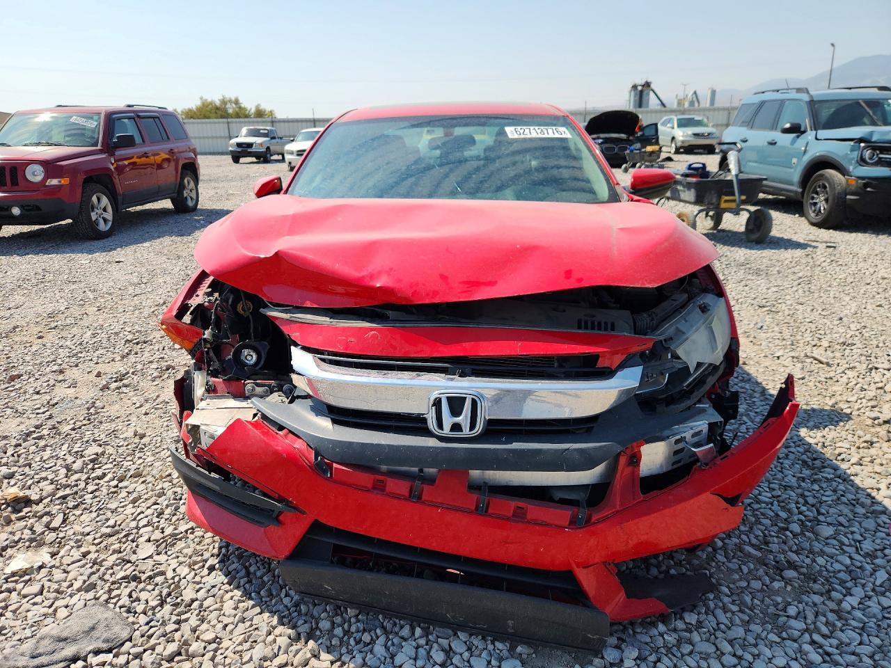 2HGFC2F75GH567023 · 2016 HONDA CIVIC · 5/12