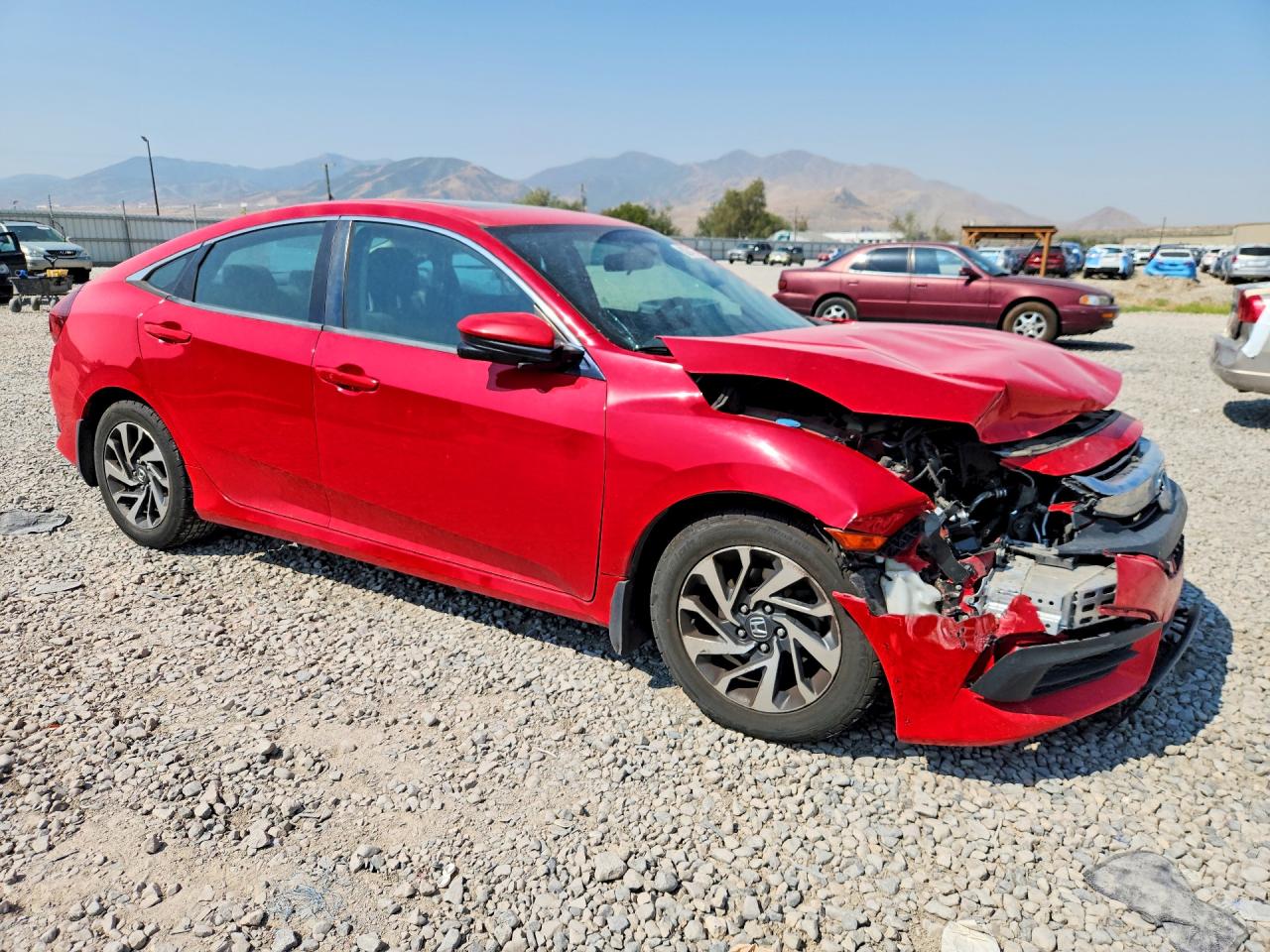 2HGFC2F75GH567023 · 2016 HONDA CIVIC · 4/12